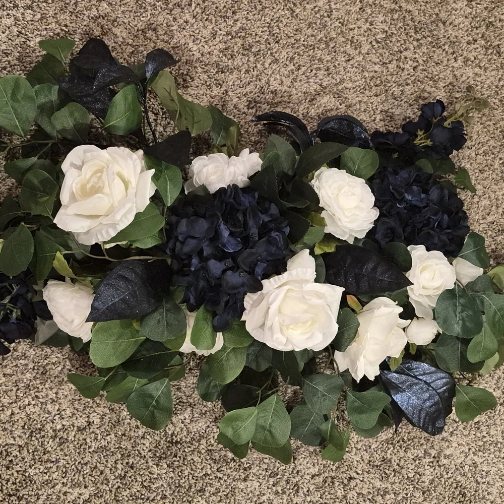 Elegant Floral Arrangement with White and Blue Accents